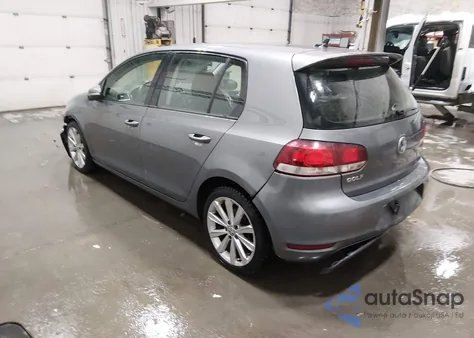 2014 Volkswagen Golf 2.0L Tdi z USA, uszkodzony, nr VIN WVWNM7AJ4EW008813